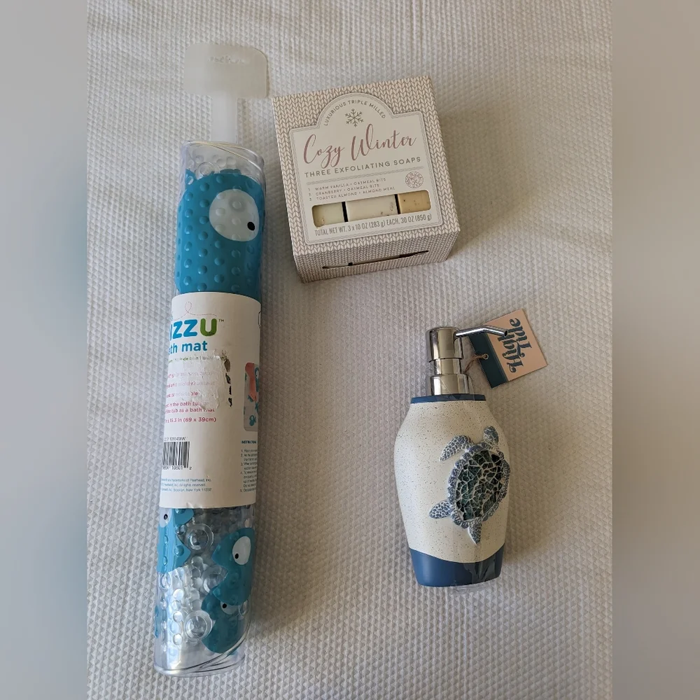3 PC Bathroom accessories Mat soap dispenser and 3 exfoliating soap.